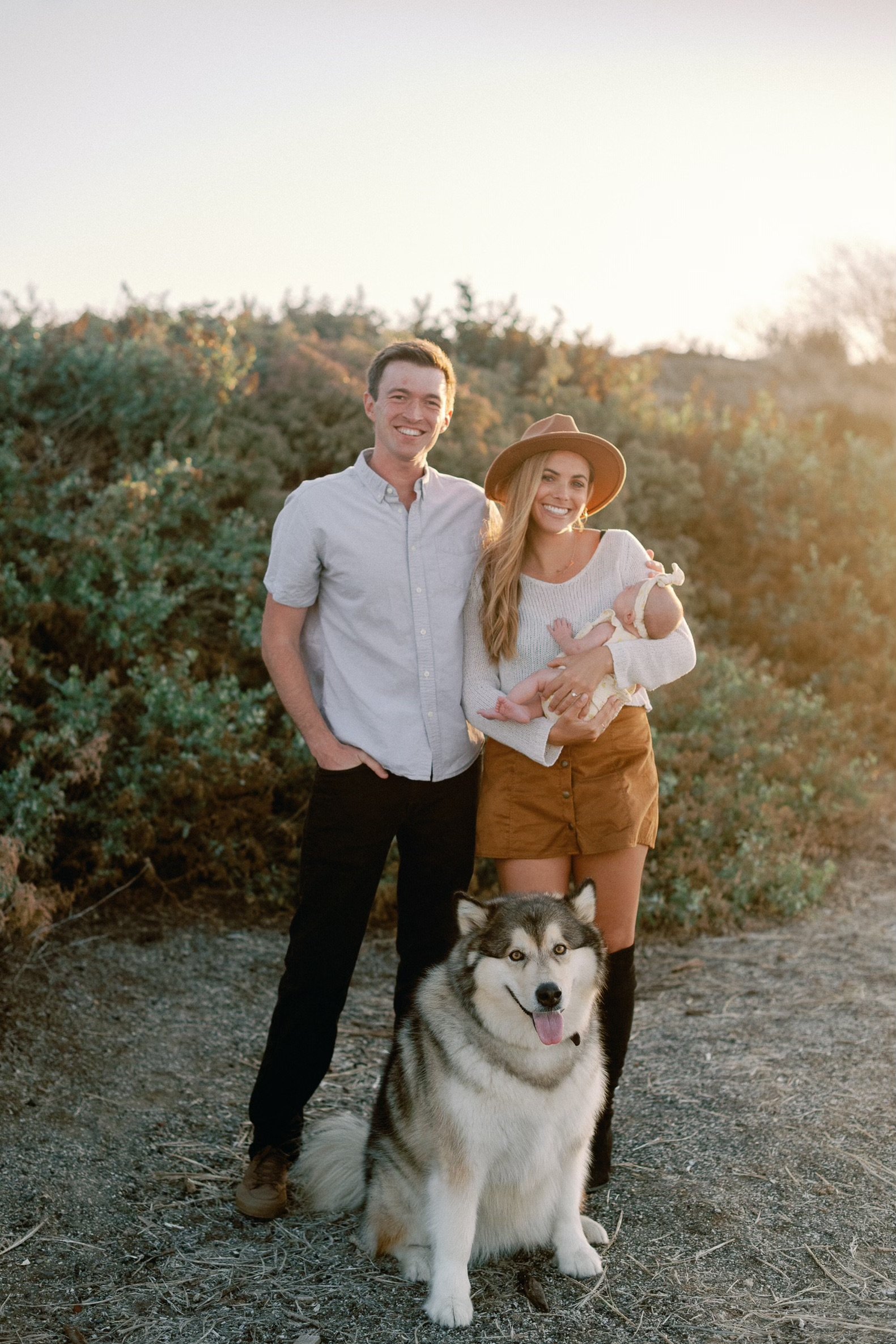L.J. Jones with his family outdoors at sunset